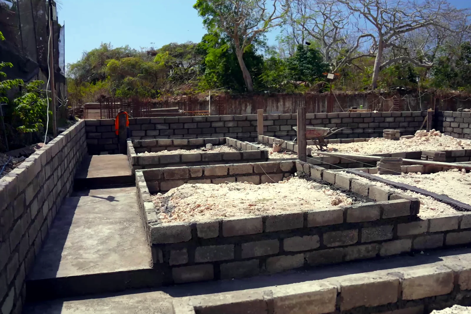 Satori villa foundations and block walls, from the August 2026 site report