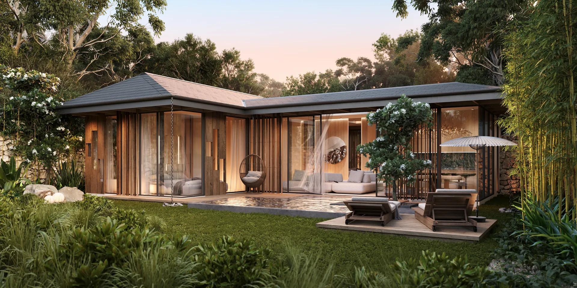 Satori two-bedroom villa with its garden and pool at dusk